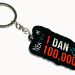 NE Kreol - 1 dan 100,000 Keyring