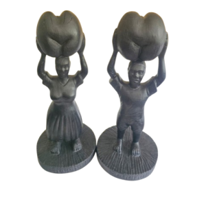 Woman & man holding a coco demer statue-one size only